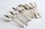 TWENTY TWO VARIOUS VICTORIAN FIDDLE PATTERN DESSERT SPOONS some crested, some initialled (