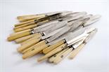 THIRTY-NINE VARIOUS VICTORIAN FISH KNIVES with ivory handles, some crested  (39)Condition reports