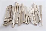 A MIXED LOT: A set of eight modern, pistol handled butter knives, six other butter knives, a set