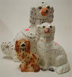 Assorted reproduction Staffordshire spaniels to include two pairs
