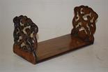 A Victorian walnut bookslide