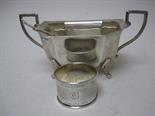 A George V silver two handled octagonal Sugar Bowl, Sheffield 1933, a Napkin Ring and small