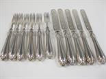 A set of six Victorian silver Fruit Forks and five matching Fruit Knives^ Sheffield 1883