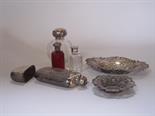 Two silver lidded clear glass Scent Bottles, two embossed Trinket Dishes, red glass Scent Bottle,