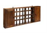 AN ENGLISH WALNUT CHINA RACK DESIGNED BY ERNEST GIMSTONthe cupboard at either end fitted with one or