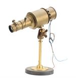 A brass electrically-lit Micro­scope Lamp, 270mm high