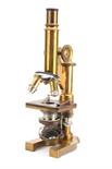 A Leitz lacquered brass Monocular Microscope, with triple nosepiece, simple stage, compass-joint