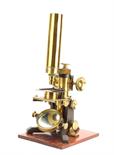 An English lacquered and anodised brass Monocular Microscope, with eyepiece, two objectives in