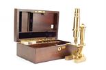 A Seibert for Leitz 1899 replica lacquered brass Monocular Microscope, no. 595/1000, in fitted