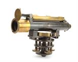 An anodised brass Troughton & Simms 12in. Level, with compass mounted below, on four-screw foot,