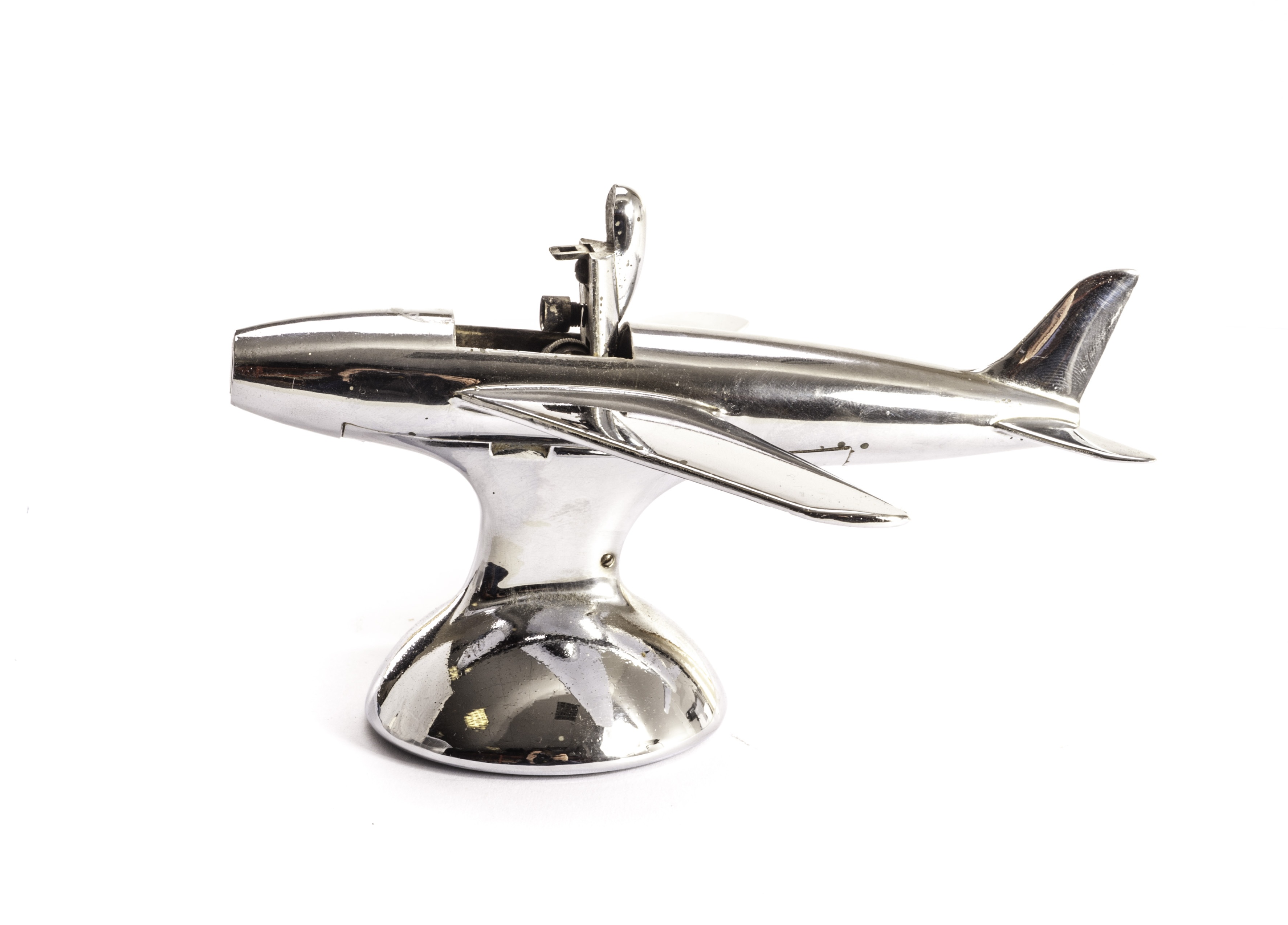 A vintage Dunhill Sabre Jet Airplane table lighter, c1950s, the chromed
