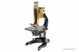 Leitz Microscopes: lacquered brass and black enamelled iron monocular Student Model, with three