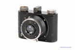 A Wirgin Reporter Camera, with Fixanar f/2.9 50mm lens, in Compur shutter, serial no. 2501596, body,