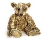 An early Steiff Teddy Bear, 1905, with apricot mohair, black boot button eyes, pronounced clipped
