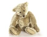 An early Steiff Teddy Bear, circa 1905, with blonde mohair, black boot button eyes, pronounced