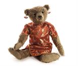 A Stier Bears `Warren` by Kathleen Wallace, No.5 of 8 with label signed by artist, and now wearing