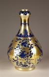 A 19th Century Blue & Silver-gilt Gourd Shaped Vase, painted with exotic birds and flowers on a