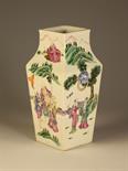 A Small Square Chinese Vase enamelled with figures in landscape and having moulded ring handles, 9