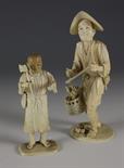 Two Japanese Ivory Carvings (A/F): One of a man with axe fitted with a composite head and stood on a