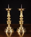 A Pair of  Fine 16th Century Flemish Brass Pricket Sticks, 15 ins (38 cms) in height.