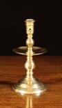 A 17th Century Brass Heemskirk Candlestick 8½ ins (22 cms) in height.