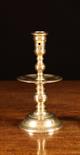 A 17th Century Brass Heemskirk Candlestick 8½ ins (22 cms) in height.