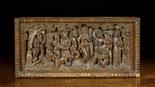 An 18th Century Carved Oak Panel depicting a gathering of demonic figures in woodland defined in