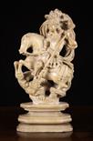 An Alabaster Carving of Saint George on Horseback slaying the Dragon (A/F),17 ins (43 cms) in