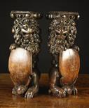 A Pair of Magnificent 16th Century Oak Posts boldly carved in the form of Heraldic Lions Sejant