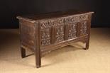 A Fine 17th Century Oak Coffer.  The edge moulded top initialed A:H in a small recessed panel.