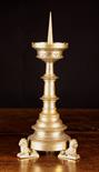 A 19th Century Gothic Revival Pricket Stick, having a blade knopped stem, crenellated drip pan and