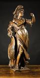 An Early 18th Century Antwerp Oak Carving of Minerva, standing in flowing robes with a plumed helmet