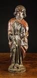 An Early 16th Century Polychromed Walnut Carving of Saint Peter  depicted wearing a long red cloak