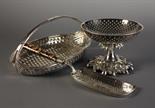 A Fine Oval Silver-plated Bread Basket composed of woven straps with reeded side edging swept up