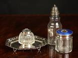 A Silver Mounted Condiment Bottle, Inkwell and Trinket Jar. The glass inkwell (lacking lid) set on