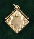 A 14 Carat Gold Pendant Locket.