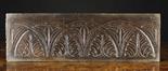 A 17th Oak Panel carved with interlaced lunette bands enhanced with punchwork and in-filled with