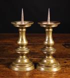 A Pair of 16th Century Bronze Pricket Sticks, 11 ins (28 cms) in height.