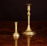 A Late 17th Century German Brass Candlestick 8 ins (20 cms) high, and a small 19th century brass