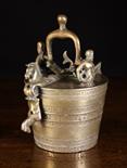 An 18th Century Nuremberg Nest of Weights. The outer bucket form container embellished with bands of