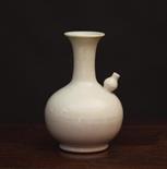 A Pale Grey Glazed Kendi, Chinese 17th Century 9 ins (23 cms) in height