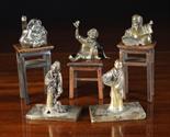 A Group of Five Chinese Antique Bronze and Brass Miniature Figures: two standing on square plinths 4