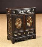 A Small Chinese Inlaid Padouk Wood Cabinet.  The two cabinet doors centred by oval panels inlaid