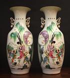 A Pair of Large Early 20th Chinese Baluster Vases with pierced lug handles, decorated with figures