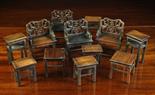 A Group of Miniature Chinese Tables and Chairs; twelve pieces in total. The four armchairs having