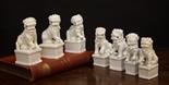 Seven Chinese Qing Dehua Blanc de Chine Foo Lion Joss Stick Holders. The foo lions sat on