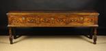 A Fine Early 18th Century Elm Low Dresser of good rich colour & patination.  The top having a