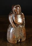 An Unusual Naively Carved Antique Treen Doll/Figure of good colour and patination.  The woman