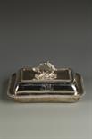 A VICTORIAN ENTREE DISH AND COVER of cushion form, gadrooned borders and pull-off cast foliate