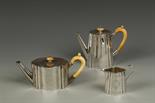 A VICTORIAN PART TEA/COFFEE SERVICE comprising teapot, coffee pot and milk jug, of shaped oval